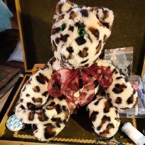 Leopard Print Plush Toy with Red Bow
